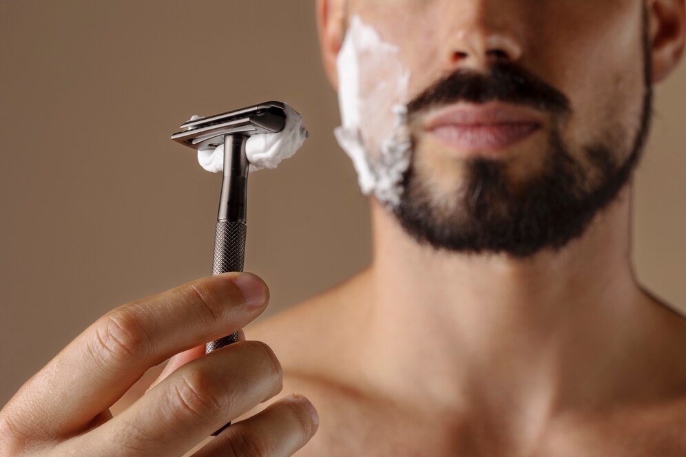 front view man holding shaving razor 23 2149615819
